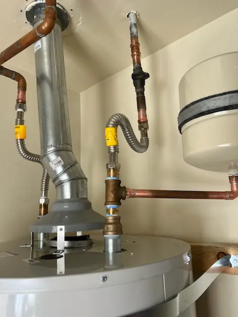 Water heater installation and plumbing repair in Christensen